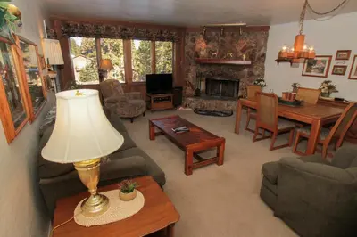 a living room with a couch and a table at Mountainback 38 pet unit in Mammoth Lakes