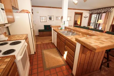 a kitchen with a sink and a counter top at Mountainback 34 Corner in Mammoth Lakes
