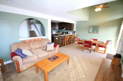 a living room with a couch and a table at Mammoth Ski Racquet Club 66 in Mammoth Lakes