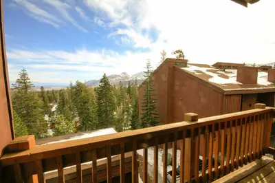 a balcony with a view of the mountains at Mammoth Ski Racquet Club 66 in Mammoth Lakes