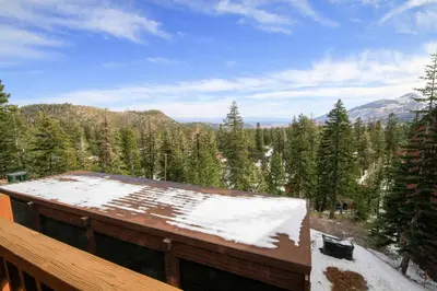 a view of a snow covered roof of a house at Mammoth Ski Racquet Club 66 in Mammoth Lakes