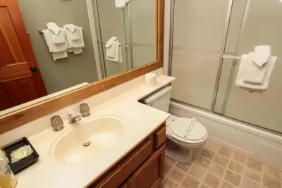 a bathroom with a sink and a shower and a toilet at Mountainback 73 Den in Mammoth Lakes