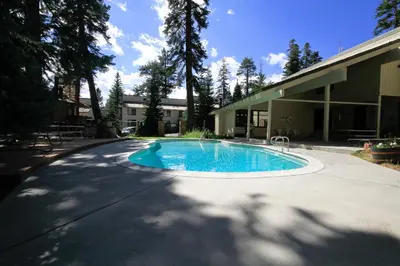 a swimming pool in a driveway next to a building at Discovery 4 #135 in Mammoth Lakes