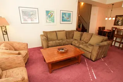 a living room with a couch and a coffee table at Silver Bear #40 in Mammoth Lakes