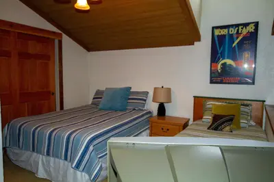 a bedroom with two beds next to each other at Mountainback 105 Loft Den in Mammoth Lakes