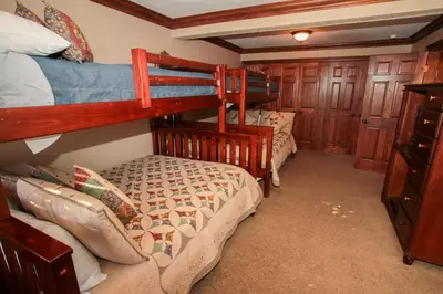 a bedroom with two bunk beds in a room at Mammoth Ski Racquet Club 34 in Mammoth Lakes