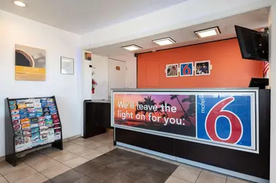 a sign on a wall in a store at Motel 6-Westley, CA in Westley