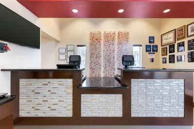 a store front with a cashier and a counter at Best Western Fallon Inn & Suites in Fallon