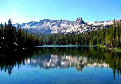 a large lake with a mountain in the background at Crestview 63 in Mammoth Lakes