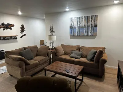 a living room with two couches and a table at Horizons 4 169 2 Bedroom 2 Bath in Mammoth Lakes