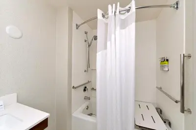 a bathroom with a shower curtain and a sink at Holiday Inn Express Lodi by IHG in Lodi