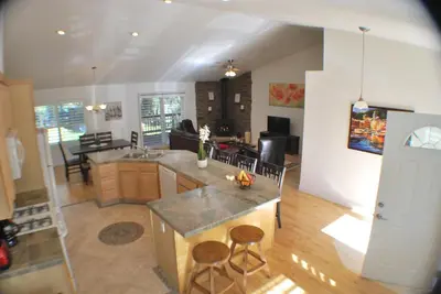 an aerial view of a kitchen and living room at Big Tom's Cabin by Yosemite, lake and trails in Groveland