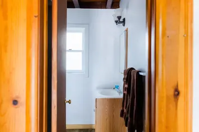 a bathroom with a sink and a mirror at The Washoe Lodge in South Lake Tahoe