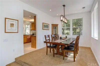 a kitchen and dining room with a table and chairs at Pine Arbor Retreat in Yosemite West