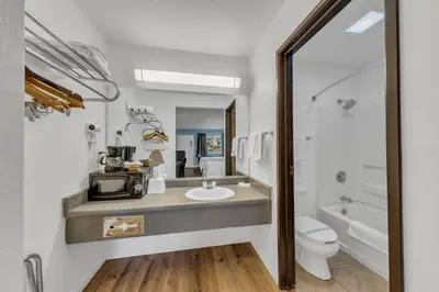 a bathroom with a sink and a toilet at Days Inn by Wyndham Carson City in Carson City