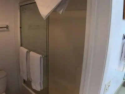 a shower with a glass door in a bathroom at Rr-edgewater08 in June Lake