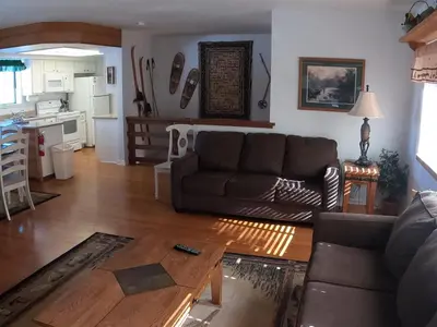 a living room with a couch and a table at Rr-edgewater08 in June Lake