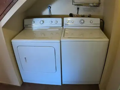 two white appliances sitting next to each other in a kitchen at Rr-edgewater08 in June Lake
