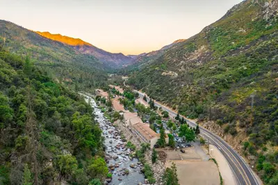 an aerial view of a train traveling through a valley at Yosemite View Lodge in El Portal