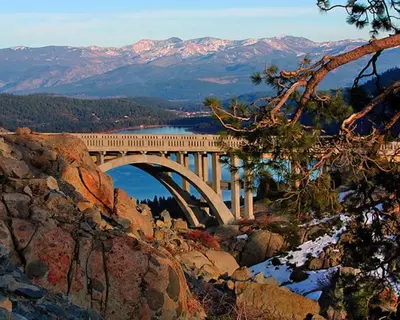 a bridge on top of a hill with a mountain at Ski View Majesty in Truckee