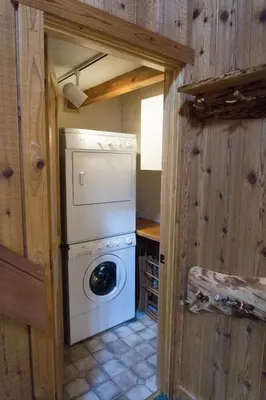 a laundry room with a washer and dryer at 824 Beaver Pond in Truckee