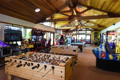 a room with several video games and a arcade at Northstar Village 237 in Truckee