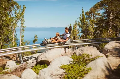 a woman and a child on a roller coaster at Zalanta 221 in South Lake Tahoe
