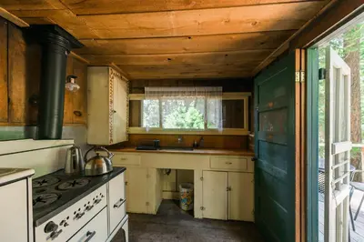 a kitchen with a stove and a sink at Silver City Mountain Resort in Sequoia National Park