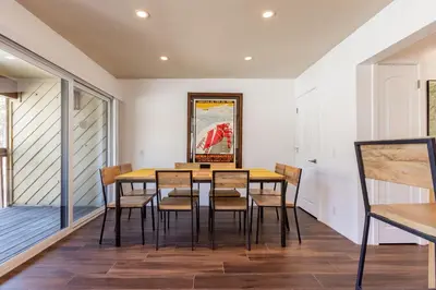 a dining room with a table and chairs at Courchevel C # 9 in Mammoth Lakes