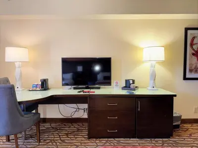 an office with a desk with a computer and two lamps at Bally's Lake Tahoe Casino Resort in Stateline