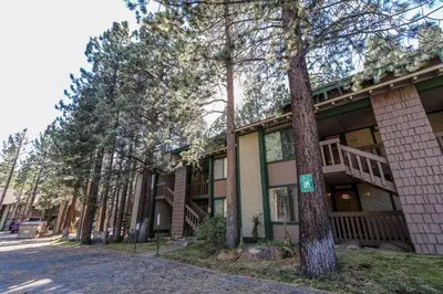 a building with trees in front of it at Sunshine Village #158 in Mammoth Lakes