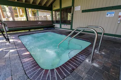 a hot tub with two metal rails in a building at Sunshine Village #158 in Mammoth Lakes