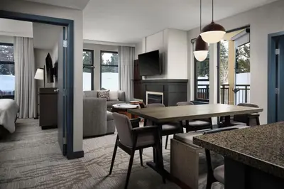 a room with a living room and a dining room at The Westin Monache Resort, Mammoth in Mammoth Lakes