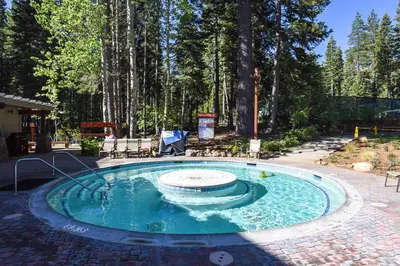 a small pool with a fountain in the middle at 3130 Aspen Grove in Truckee