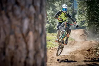 a person riding a bike on a dirt trail at 4025 Ski Trails in Truckee