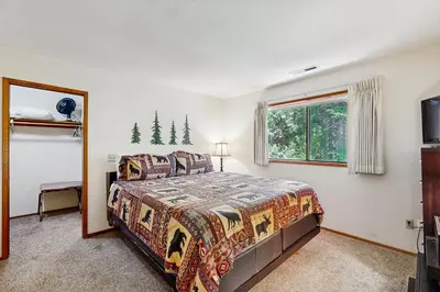 a bedroom with a bed and a window at On The 9th in Arnold