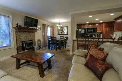 a living room with a couch and a table at Horizons 4 #165 Condo in Mammoth Lakes