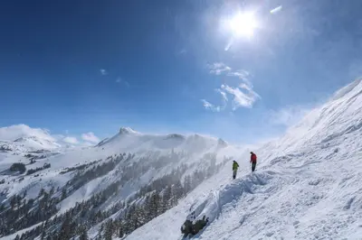 two people standing on top of a snow covered mountain at R110 Timber Ridge in Kirkwood