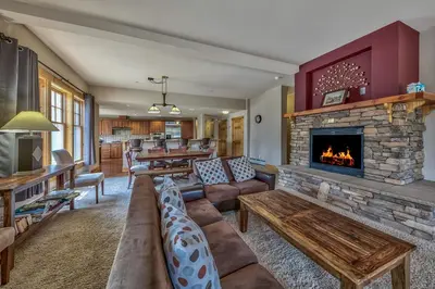 a living room with a couch and a fireplace at R101 Timber Ridge in Kirkwood