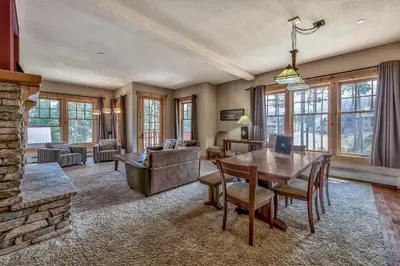 a living room with a table and a couch at R101 Timber Ridge in Kirkwood