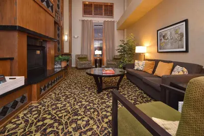 a living room with a couch and a table at Hampton Inn & Suites Carson City in Carson City