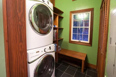 a washer and dryer in a room with a window at Luxury Lodgepole Home at Northstar in Truckee