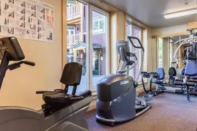 a gym with treadmills and elliptical machines at Sunstone 326 in Mammoth Lakes