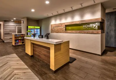 a lobby of a home store with a counter at Home2 Suites By Hilton Reno in Reno