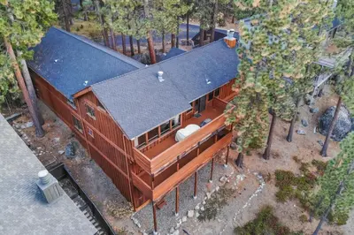 an overhead view of a house with a black roof at Skyland Retreat - Max nighttime occupancy of 8 in Zephyr Cove