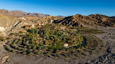 an aerial view of a resort in the mountains at The Inn at Death Valley in Death Valley