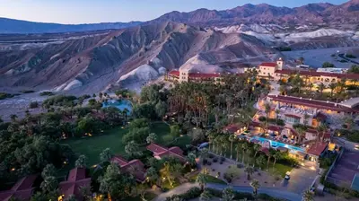 an aerial view of a resort with mountains in the background at The Inn at Death Valley in Death Valley