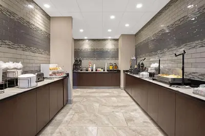 a restaurant with aasteryasteryasteryasteryasteryasteryasteryasteryasteryasteryasteryastery at La Quinta by Wyndham Rancho Cordova Sacramento in Rancho Cordova