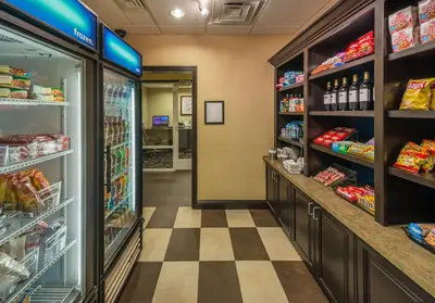 a store aisle of a grocery store with food at Hampton Inn & Suites Reno in Reno