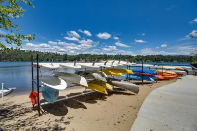 a bunch of boats are lined up on the beach at Lake Lodge Beach (04-040) in Groveland